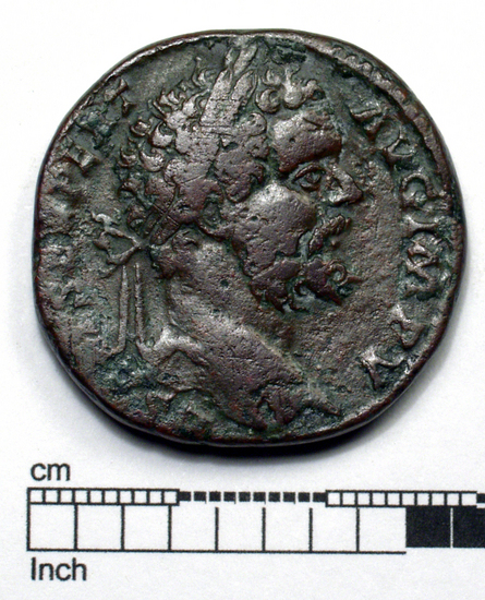 Hearst Museum object titled Coin: æ sestertius, accession number 8-4883, described as Coin; AE; Sestertius; Roman. 23.74 grams, 28.5 mm. Septimius Severus, 195 AD. Rome, Italy. Obverse: L SEPT SEV PERT AVG IMP V, bust r. laureate. Reverse: PART ARAB PART ADIAB, two captives seated at foot of trophy; in field, S C; in exergue, COS II PP.