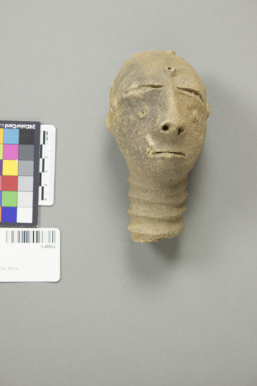 Hearst Museum object titled Clay head, accession number 5-4880a, described as (a) Reddish-brown terracotta head and neck of female with incised features and scarification marks; typical slit eyes and mouth; domed forehead; well-modeled nose; carved representation of "choker" around neck; (b) contemporary wooden pedestal base.