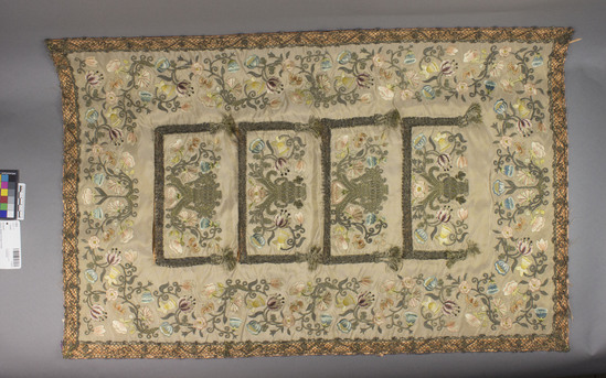 Hearst Museum object titled Textile, accession number 7-3231, described as Wall pocket; silk taffeta; embroidered; metal-wrapped yarns; light brown ground, varicolored floral designs; orange lining lace trim; 3 pockets. 20 X 30 3/4