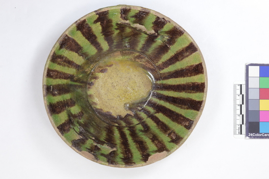 Hearst Museum object 2 of 4 titled Bowl, accession number 6-20274, described as Pottery bowl, green glaze inside and out; diameter 15 cm. Arabic.