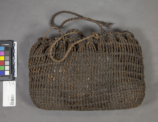 Hearst Museum object titled Basket, accession number 9-23049, described as A woven basket made of "shina" or linden.