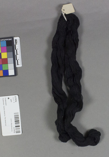 Hearst Museum object titled Skein of yarn, accession number 3-27970c, described as skein of black cotton yarn, single ply, Z twist; 11" skein