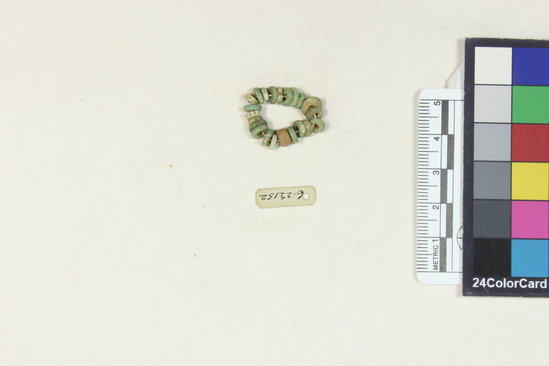 Hearst Museum object titled Beads, accession number 6-22152, described as beads, star-shaped and disc, of gray and green faience