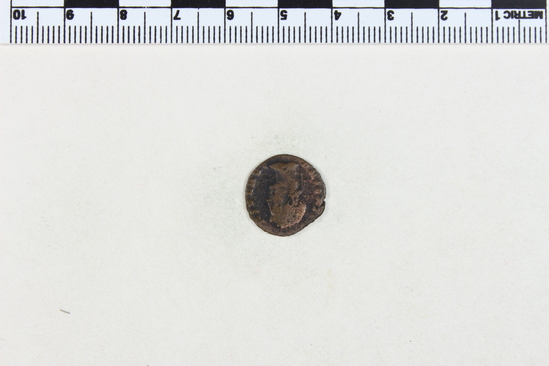 Hearst Museum object 4 of 4 titled Coin: æ 4, accession number 8-8804, described as Coin AE 4 Reverse: standard between 2 soldiers