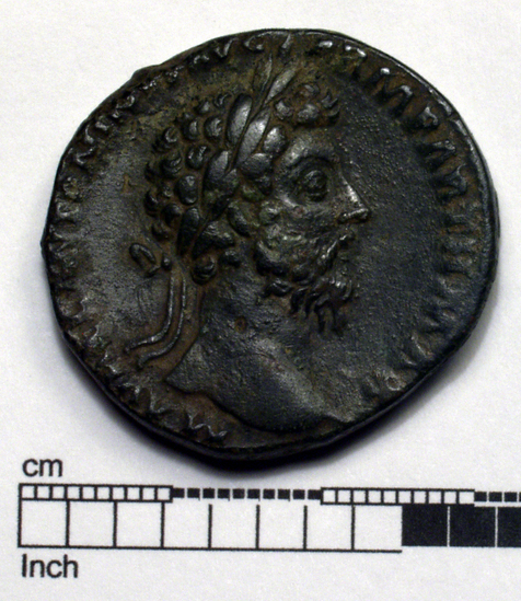 Hearst Museum object titled Coin: æ, accession number 8-4023, described as Coin; AE; Roman. Marcus Aurelius, 166 AD. Rome, Italy. Obverse: MAVREL ANTONINVS AVG ARM PARTH MAX Bust r. laureate. Reverse: TR POT XX IMP IIII COS III. Victory standing r. holds shield inscribed VIC/ PAR; in field, S C.