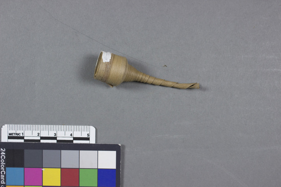 Hearst Museum object titled Bamboo and reed tobacco pipe, accession number 11-14977, described as Pipe for tobacco (päip päini); rolled coconut leaf strips; cone shaped; 6 x 1.5 cm. Smoking was introduced by whalers in the pre-Spanish period (1850s)