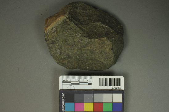 Hearst Museum object titled Core, accession number 2-36985, described as Plano-covex chopper of metamorphosed conglomerate, shows developed wear pattern