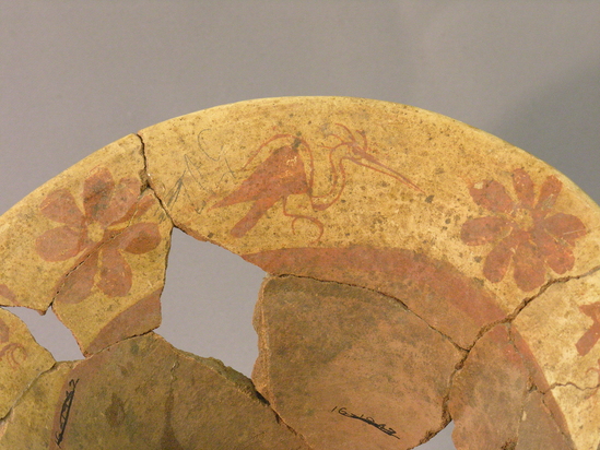 Hearst Museum object 4 of 4 titled Bowl;flaring, accession number 4-3169, described as Flaring bowl design of birds & flowers in red on white around rim, broken, mended