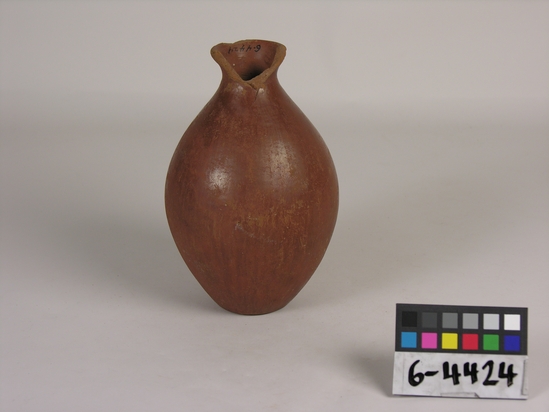 Hearst Museum object titled Broken bottle, accession number 6-4424, described as Pottery: red bottle, rim broken; least diameter 5 cm, greatest diameter 12 cm, height 18 cm.