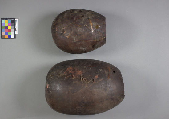 Hearst Museum object titled Gourd and wooden instrument, and drumstick, accession number 5-4388a,b, described as Per inventory 6/13/12, found 6 objects with "A" and one unnumbered braided cloth.