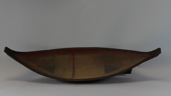 Hearst Museum object 2 of 4 titled Canoe model, accession number 2-7290, described as Dugout canoe; outside varnished; painted red and black.