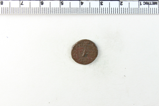 Hearst Museum object 3 of 6 titled Coin: æ, accession number 8-4819, described as Coin; AE; Greek. 1.25 grams, 14 mm. Sinatruces, 77-70 BC. Parthia. Obverse: bust of Sinatruces l. bearded, helmeted, diademed, cuirassed. Reverse: bow in case. Remarks:  "inscription:- just escapes legibility (surrounds bow case).