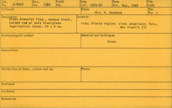 Documentation associated with Hearst Museum object titled Bracelet fragment, accession number 9-8047, described as Glass bracelet frag.; opaque black, curved rod w/ pale blue-green longitudinal bands; 20 x 6 mm.