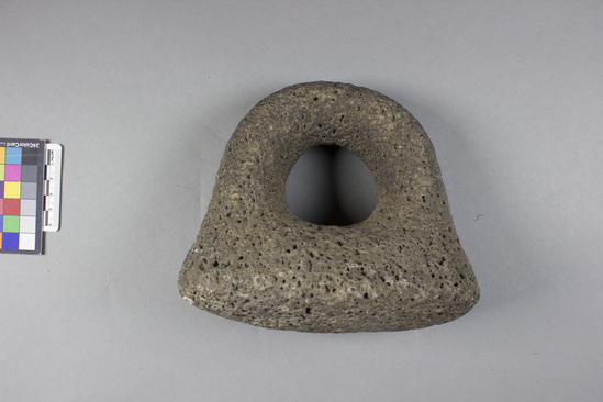 Hearst Museum object titled Pōhaku ku‘i ‘ai (poi pounder), accession number 11-1712, described as Poi pounder; ring type; of coarse lava.