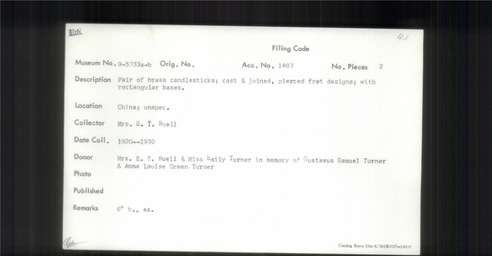 Documentation associated with Hearst Museum object titled Candlesticks, accession number 9-5333a,b, described as Pair of brass candlesticks; cast and joined, pierced fret designs; with rectangular bases.