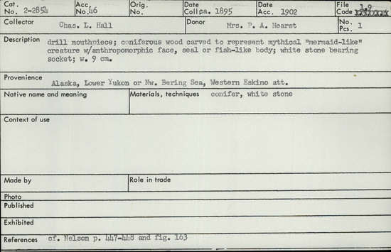 Documentation associated with Hearst Museum object titled Mouthpiece, accession number 2-2854, described as Drill mouthpiece; coniferous wood carved to represent mythical "mermaid-like" creature with anthropomorphic face, seal or fish-like body; white stone bearing socket.