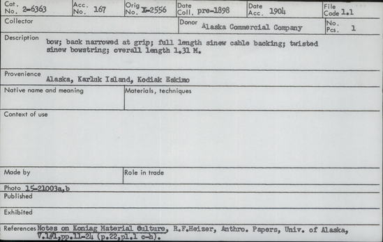 Documentation associated with Hearst Museum object titled Bow, accession number 2-6363, described as Back narrowed at grip, full length sinew cable backing. Twisted sinew bowstring. Wood carved; on front side reinforced with a small bundle of braided sinew strings, decorated with tufts of red & black wool (?); the bow string is a strong twisted sinew cord; the section of wood is convex on front & practically flat on back surface. Alutiiq name: qitguyaq.