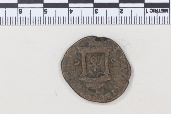 Hearst Museum object 3 of 8 titled Coin: æ sestertius, accession number 8-6009, described as Coin: Once sestertius (?); Æ; Trebonianus - 11.66 grams. Obverse: [IMP]CAESVIBIVS TREBONIANVS GALLVS AVG - Bust facing right, draped, laureate. Reverse: IVNONIMAR[TIALI], SC - Juno seated front in round distyle temple: at her side, peacock.