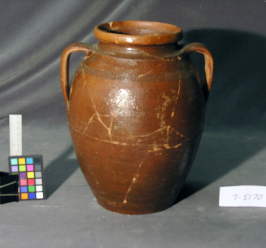 Hearst Museum object titled Jug, accession number 7-5170, described as Pottery jug (k'up); glazed brownware; two handles; incised parallel lines near neck; outcurved rim; 30 cm height