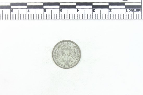 Hearst Museum object 3 of 4 titled Coin: billon 10 kreuzer, accession number 7-6142, described as Coin, billon. Weight 1.66 grams. Condition: fine. Denomination: 10 Kreuzer. Obverse description: Head of Franz Joseph, facing right, laureate. Reverse description: Eagle, number 10 center. Inscription round inside.