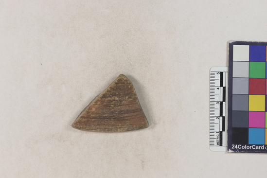 Hearst Museum object titled Potsherd, accession number 16-8173, described as Potsherd; rim, brown slip Section of Manta on beach currently inhabited. Numbers  8111 to 8194 are sherds picked up on beach at low tide.