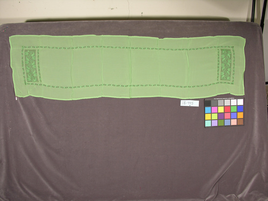 Hearst Museum object titled Shawl, accession number 18-445, described as Shawl; light green rayon with drawnwork. For manâs daily use. 42.5 x 168 cm.