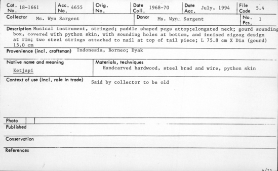 Documentation associated with Hearst Museum object titled Musical instrument, accession number 18-1661, described as Musical instrument, stringed; paddle shaped pegs atop elongated neck; gourd sounding box, covered with python skin, with sounding holes at bottom, and incised zigzag design at rim; two steel strings attached to nail at top of tail piece. Said by collector to be old. Length 75.8 cm. Diameter (gourd) 15.0 cm.