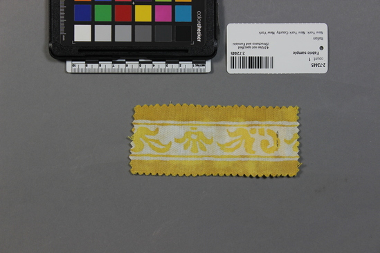 Hearst Museum object 1 of 2 titled Fabric sample, accession number 2-72445, described as 100% long staple cotton sample, no. 5252, Olimpia design, border,  yellow and white (texture) color, Fortuny Inc.