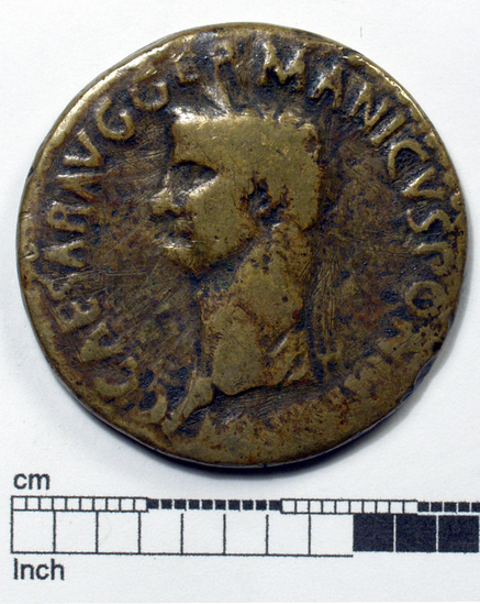 Hearst Museum object titled Coin: æ sestertius, accession number 8-6456, described as Coin; AE; Sestertius; Rome. (20.9 grams, 38 mm). Obverse: C CAESAR AVG GERMANICVS... PON[MTRPOT]. Bare head of Caligula, facing left. Reverse: ADLOCVT above; COH• in exergue. Caligula on platform at right, exhorting troops (5 soldiers) at left.