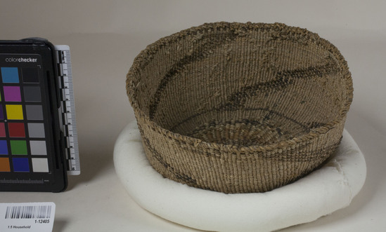 Hearst Museum object 2 of 2 titled Dish basket, accession number 1-12405, described as Dish basket (maksu); twined. Warp is twisted Tule (Schoenoplectus acutus), weft is twisted Tule and Cattail (Typha latifolia). Brown pattern is Tule root. Brown dye is grayish Tule skin in mud.