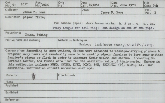 Documentation associated with Hearst Museum object titled Pigeon flute, accession number 9-9652, described as pigeon flute; 2 bamboo pipes; dark brown stain; ht 5 cm, w. 4.2 cm. ivory tongue for tail ring; cut design on end of one pipe.