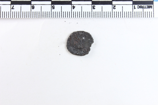 Hearst Museum object 7 of 7 titled Coin: æ, accession number 6-22817, described as Copper coin.