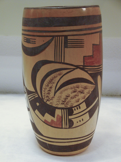 Hearst Museum object 2 of 2 titled Jar, accession number 2-48469, described as Tall, ceramic, polychrome, abstract designs in black and red on orange.