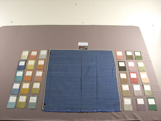 Hearst Museum object 6 of 6 titled Textile sample, accession number 2-62442a-ee, described as Yardage; upholstery fabric. Rayon, plain weave, shades of blue  Vertical stripe formed by varicolored, blue warp threads, plain weft.  F. Schumacher Fabrics