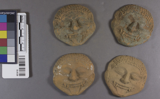 Hearst Museum object 14 of 18 titled Figurine, accession number 8-4129, described as Mask of Medusa (gorgon) terracotta varied pattern, smaller