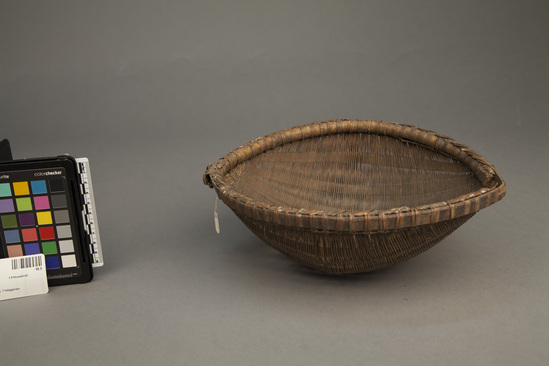 Hearst Museum object titled Basket, accession number 10-5, described as Rice strainer; twined; rattan and bamboo; handle gone; 10 1/2 inches long.