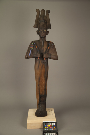 Hearst Museum object titled Osiris figurine, accession number 5-288, described as Inlaid wooden figure of Osiris. Height: 42 inches.