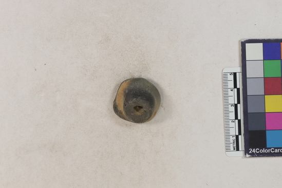 Hearst Museum object 2 of 2 titled Potsherd, accession number 16-8127, described as Potsherd; Handle frag, drilled hole Section of Manta beach currently inhabited. Numbers  8111 to 8194 are sherds picked up on beach at low tide.