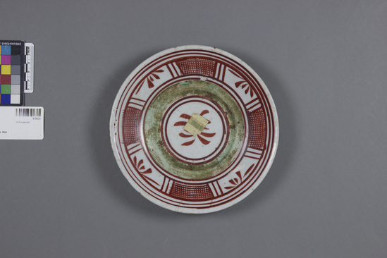 Hearst Museum object titled Bowl, accession number 9-5624, described as Shallow porcelain bowl; white, overglaze decoration red bands, one green band.