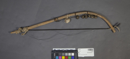 Hearst Museum object 3 of 4 titled Musical bow, accession number 9-10948, described as Bow for stringed musical instrument; wood, horsehair, metal bells; 50 cm. length