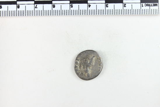 Hearst Museum object 4 of 8 titled Coin: ar denarius, accession number 8-4665, described as Coin; AR; Denarius; Roman. 3.07 grams, 18 mm. Vespasian, 69-70 AD. Rome, Italy. Obverse: IMP CAESAR VESPASIANVS AVG, bust r. laureate. Reverse: COSITER TR POT, Pax seated left holding caduceus and branch.