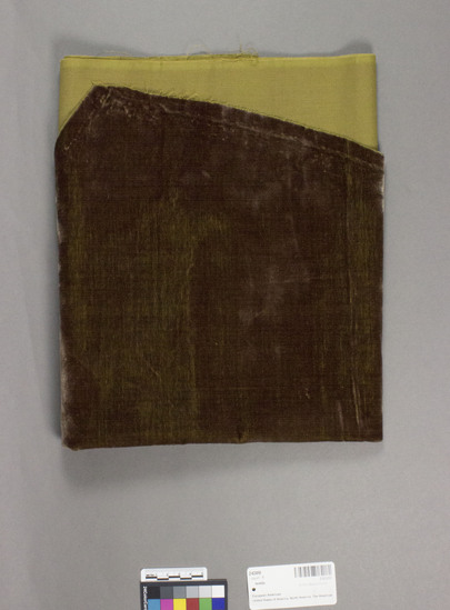 Hearst Museum object titled Textile, accession number 2-62450, described as Irregular strip; cotton, rayon or silk?, cut pile, colors red, and yellow green foundation