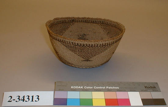 Hearst Museum object titled Basket, accession number 2-34313, described as Twined tule rush.  Brown and tan design.