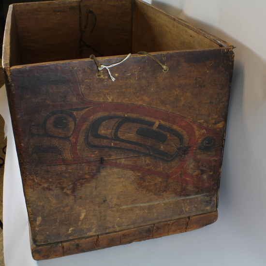 Hearst Museum object 3 of 6 titled Chest, accession number 2-10847a, described as (a) Oblong cedar blanket chest Length - 30 inches, width - 18 inches x 18 inches. Whale design on one side, grizzly bear on other. *Whale and grizzly bear (are associated in mythology) identified by Charles Brown.