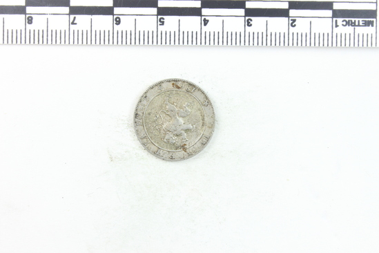 Hearst Museum object 3 of 4 titled Coin, accession number 7-6169, described as Belgium coin, nickel, five centimes, obverse lion rampant center, ringed by inscription "L'UNION FAIT LA FORCE", below 1862, reverse "5 CENTIMES" center, ringed by inscription "LEOPOLD PREMIER ROI DES BELGES", date 1861-1864.