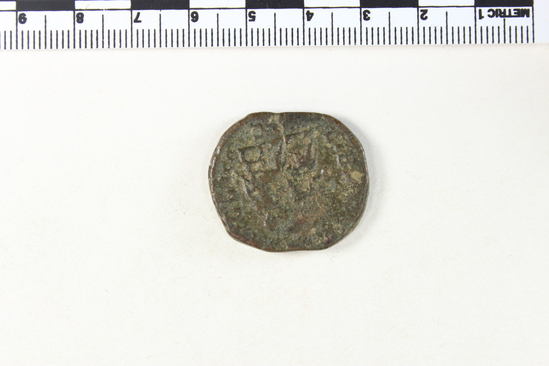 Hearst Museum object 3 of 8 titled Coin: æ sestertius, accession number 8-6355, described as Coin: Sestertius; Æ; Philip I (?) - 15.02 grms. Obverse: IMP MI ... AVG - Bust facing right laureate, draped. Reverse: LIBERTA[LITAS A]VGG - III, SC in exergue - Philip I and II seated facing left on curule chairs, each holding scepter and abacus.