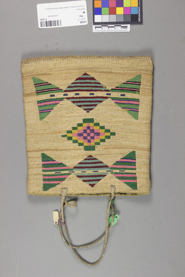 Hearst Museum object 5 of 8 titled Bag, accession number 2-22260, described as Multi-colored corn husk bag; cornhusk and wool overlay in plain twining; geometric designs in colored wool yarn on both faces; 2 rawhide thong handles.