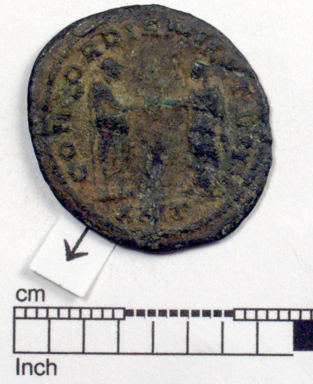 Hearst Museum object 6 of 8 titled Coin: billon antoninianus, accession number 8-6012, described as Coin: Antoninianus; AR [?], Æ; Aurelianus - 3.03 grams. Obverse: IMP C AVRELIANVS AVG - Bust facing right radiate, cuirassed. Reverse: CONCORDIA MILITVM -  Emperor and Concordia clasping hands, [untranscribable symbols].