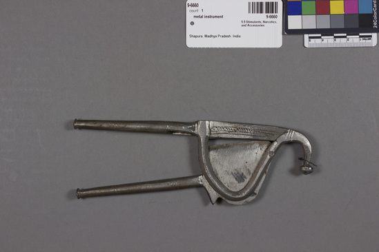 Hearst Museum object titled Metal instrument, accession number 9-6660, described as Forged iron betel nut slicer; “hook” at one end; length 7  1/2 inches.