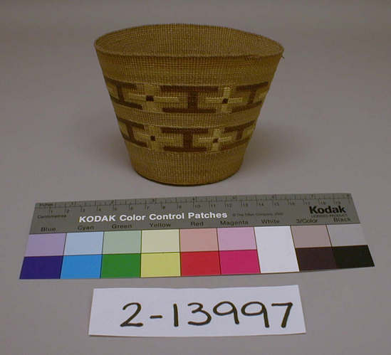 Hearst Museum object 1 of 2 titled Basket, accession number 2-13997, described as Twined, cup shaped, brown and yellow bands.